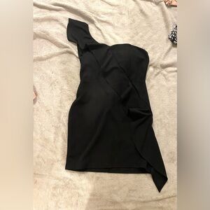 I am selling a black dress in a size Large.